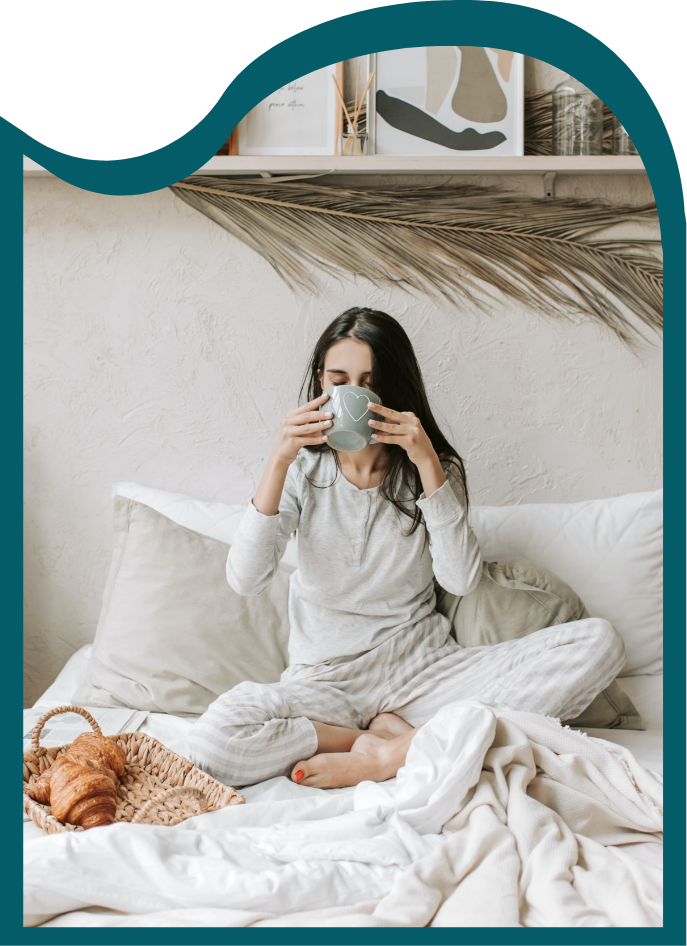 woman drinking coffee in her 2 bedroom apartment home in Minneapolis